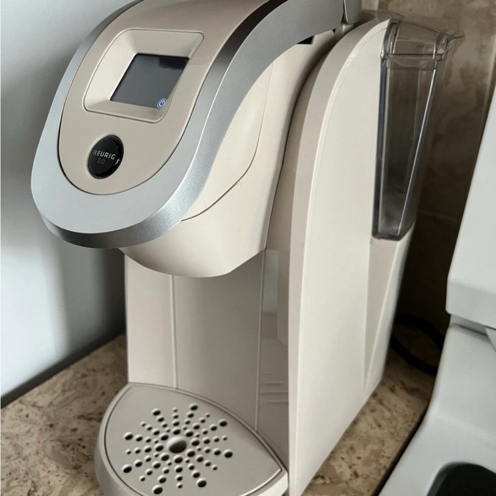 Keurig Cream and Silver Coffee Maker with Sleek Design